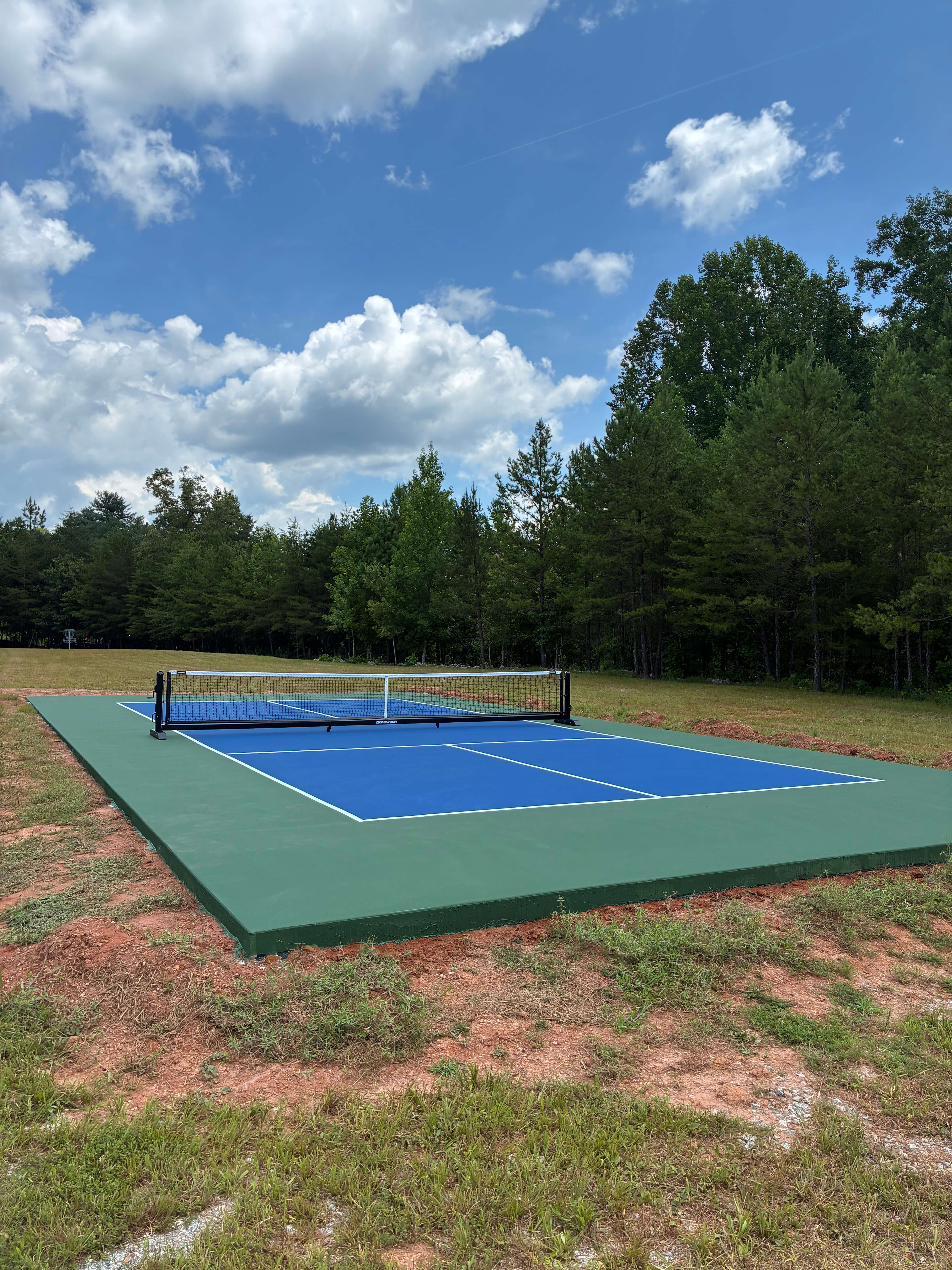 Backyard pickleball court built for a client in Greensboro, North Carolina.